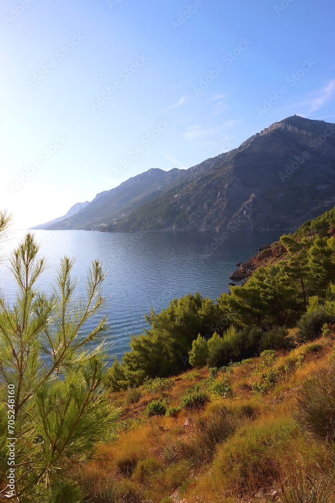 Obraz premium Beautiful view of Biokovo mountain and Adriatic Sea in Brela, Croatia.