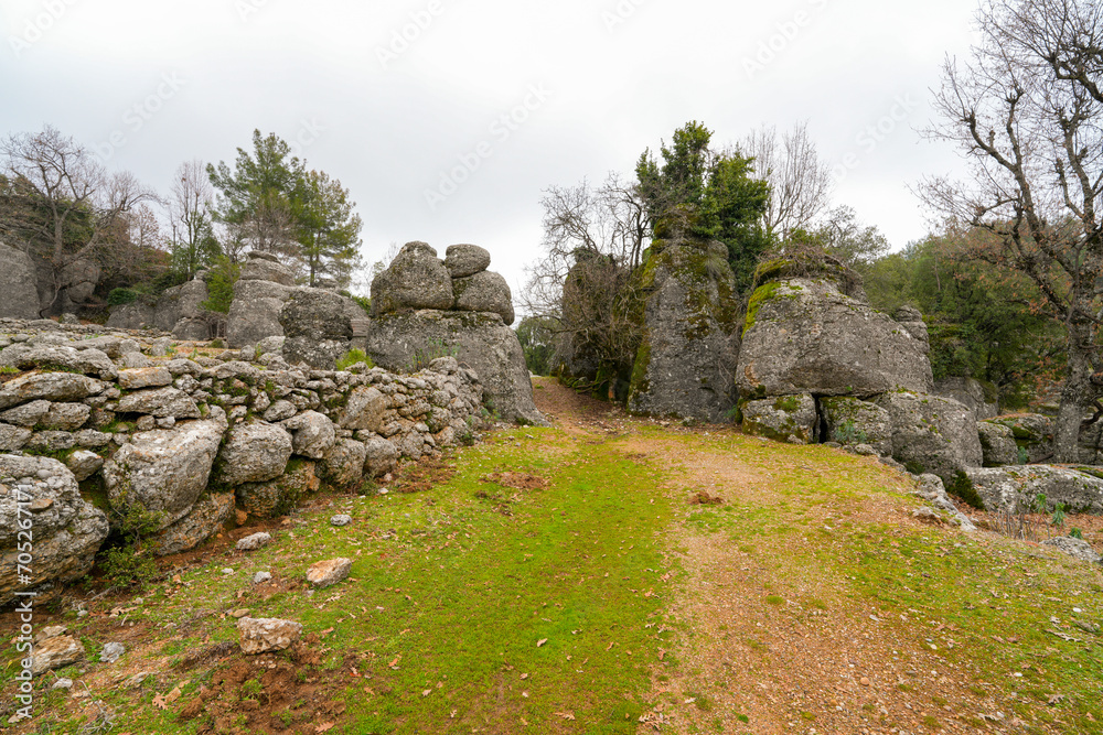 Majestic view of valley with beautiful rock formations on a autumn day. Adamkayalar, Selge, Manavgat, Antalya, Turkey. Majestic view of valley with beautiful rock formations on a autumn day. Adamkayalar, Selge, Manavgat, Antalya, Turkey.