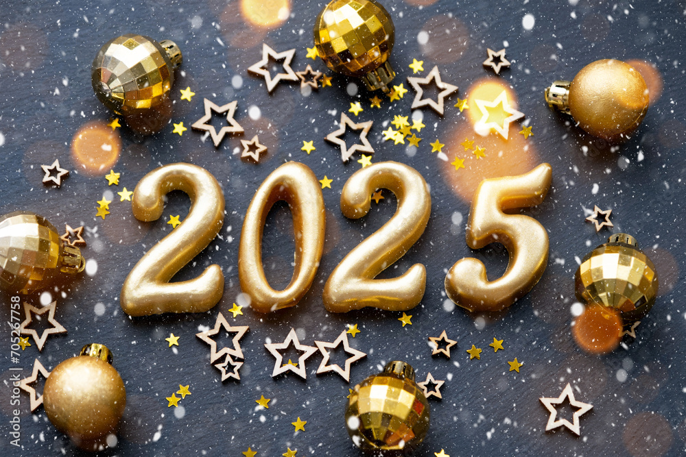 The golden figures 2025 made of candles on a black stone slate background are decorated with a festive decor of stars, sequins, fir branches, balls and garlands. Greeting card, happy New Year. The golden figures 2025 made of candles on a black stone slate background are decorated with a festive decor of stars, sequins, fir branches, balls and garlands. Greeting card, happy New Year.