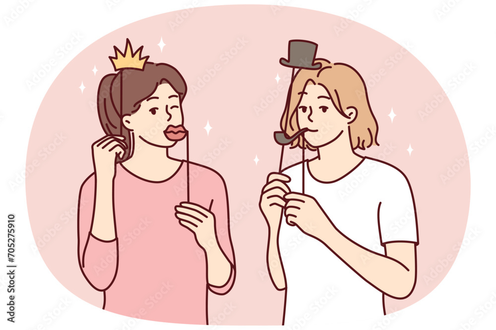 Girl friends with funny masks for photo shoot during house party or holiday carnival. Young casual women put cardboard lips and smoking pipe or crown with hat on their face. Flat vector illustration Girl friends with funny masks for photo shoot during house party or holiday carnival. Young casual women put cardboard lips and smoking pipe or crown with hat on their face. Flat vector illustration