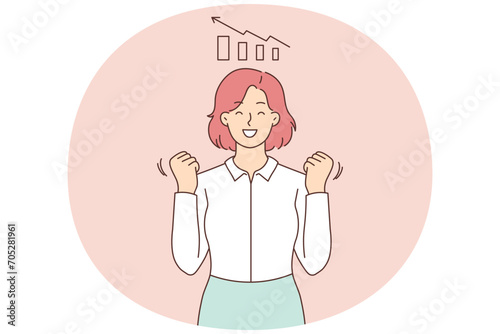 Smiling businesswoman excited with sales growth