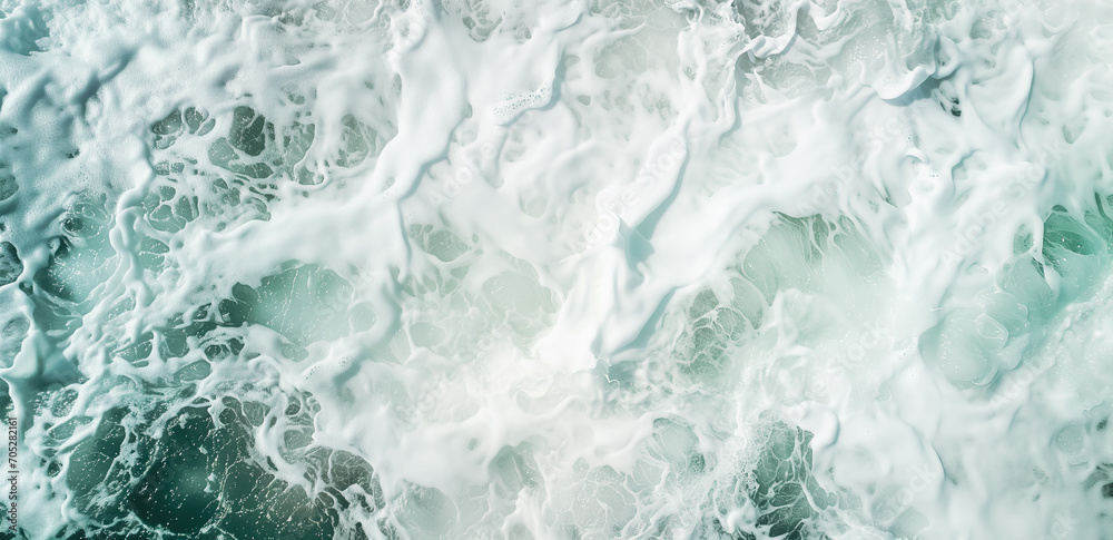 Blue ocean water texture background. Turquoise foamy surface of the sea with wave.
Blue ocean water texture background. Turquoise foamy surface of the sea with wave.