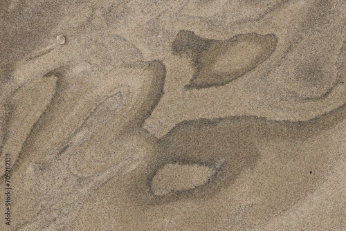 Natural pattern on the beach sand, black and white.