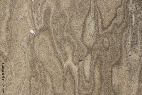 Natural pattern on the beach sand, black and white.