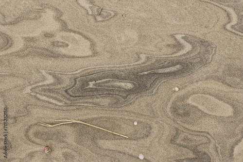 Natural pattern on the beach sand, black and white.