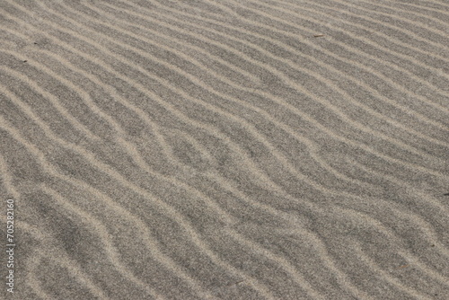 Natural pattern on the beach sand, black and white.
