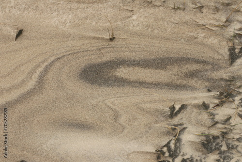 Natural pattern on the beach sand, black and white.