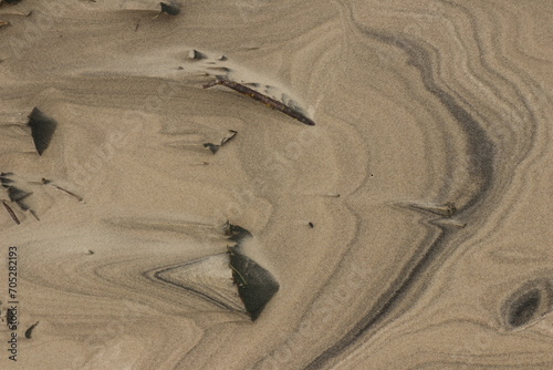 Natural pattern on the beach sand, black and white.