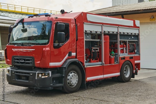 A state-of-the-art firetruck  equipped with advanced rescue technology  stands ready with its skilled firefighting team  prepared to intervene and respond rapidly to emergencies  ensuring the safety