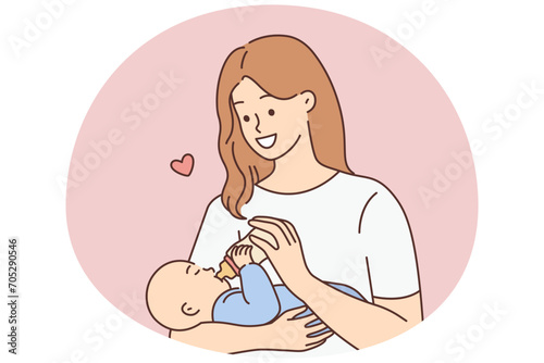 Happy woman feeding infant