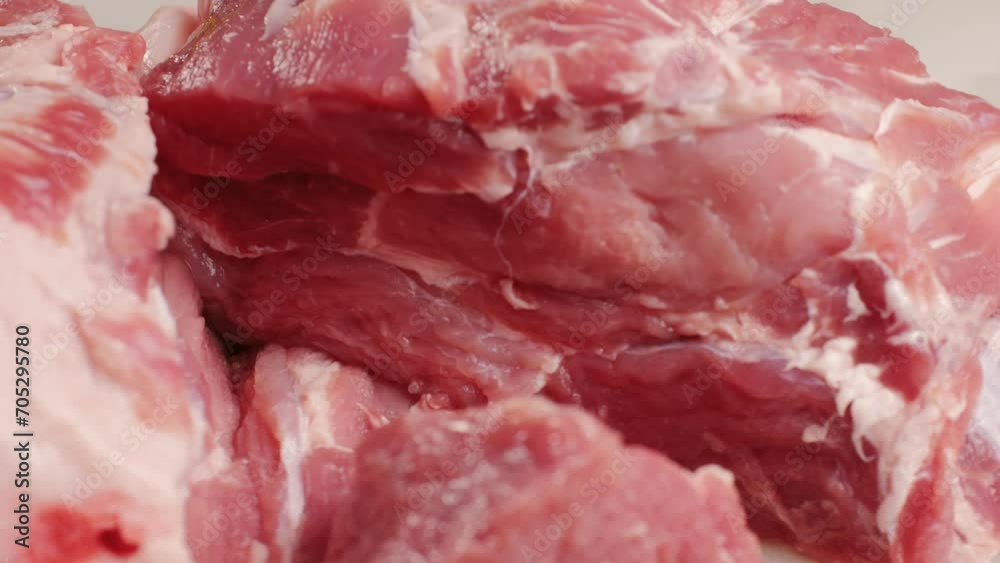 Chef Butcher cutting pork meat with knife on kitchen, cooking Mexican traditional food. Man cut big beef piece for barbecue bbq. Chef Butcher cutting pork meat with knife on kitchen, cooking Mexican traditional food. Man cut big beef piece for barbecue bbq.