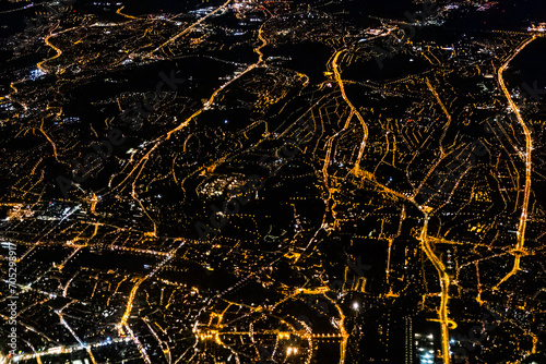 Nightscape of the city with lights from the aerial view.