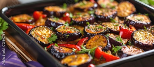 Tasty roasted dish with red pepper and eggplant