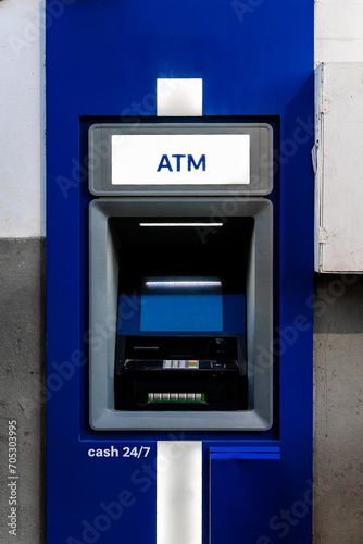 Built-in ATM machine on the street.