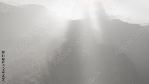 desert landscape of the Pamir Mountains in fog photo
