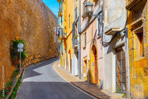 Narrow street in old town of Tarragona, Catalonia, Spain photo
