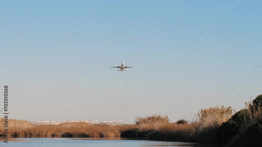 Airplane landing to airport runway at sunset, plane arrivals, international airport spotting, boarding of big passengers international flight. Airplane landing to airport runway at sunset, plane arrivals, international airport spotting, boarding of big passengers international flight.