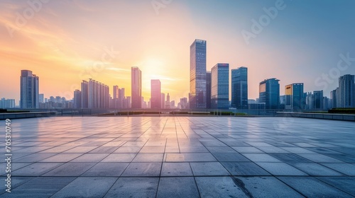 Empty square floors and city skyline with modern buildings at sunset in Suzhou, Jiangsu Province, China. high angle view © Orxan