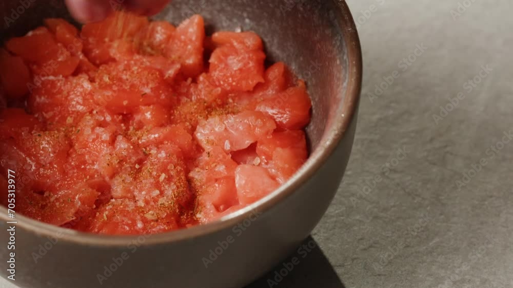 Chilean salmon tartar seviche with pouring lemon lime and grapefruit juice, onion Healthy diet food, close up red fish tar tar. Chilean salmon tartar seviche with pouring lemon lime and grapefruit juice, onion Healthy diet food, close up red fish tar tar.