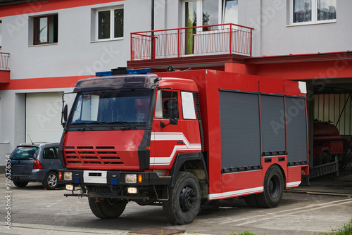 A state-of-the-art firetruck, equipped with advanced rescue technology, stands ready with its skilled firefighting team, prepared to intervene and respond rapidly to emergencies, ensuring the safety