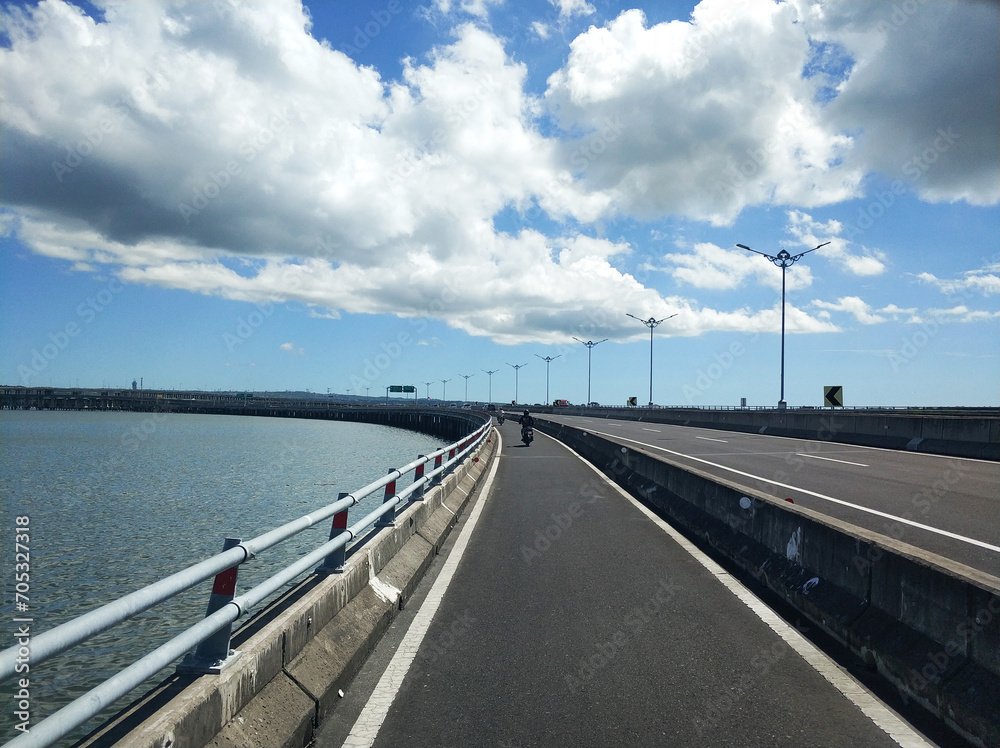Riding along the part of the toll road designated for motorcycles across the water
