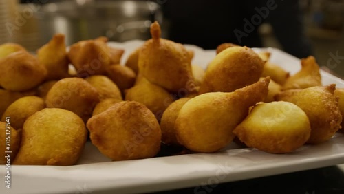 Typical Naples street food with fried zeppole photo