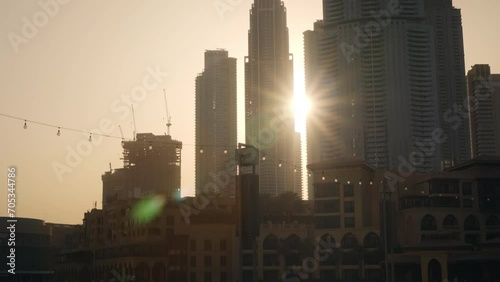 Wallpaper Mural Sunrise in Downtown Dubai, sun between majestic skyscrapers, smooth shot Torontodigital.ca