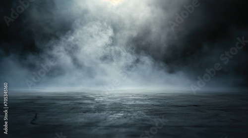 Concrete floor with smoke or fog in dark room with spotlight. Asphalt night street background. © Pro Hi-Res