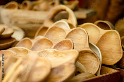Wooden kitchenware and decorations sold on Easter market in Vilnius. © MNStudio