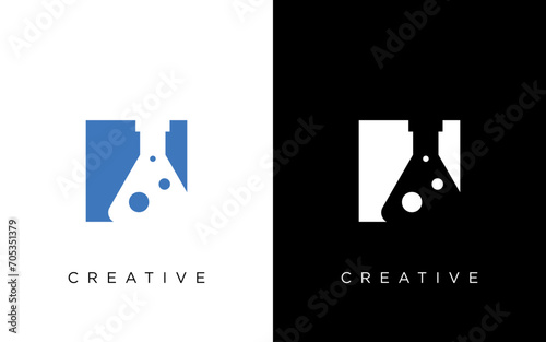 Lab logo letter icon vector isolated design with laboratory glass and alchemist process