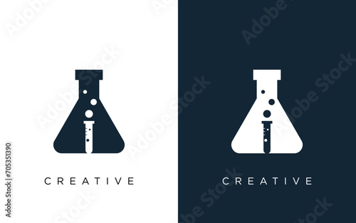 Lab logo letter icon vector isolated design with laboratory glass and alchemist process