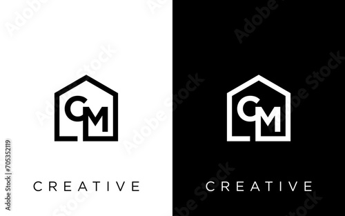 modern CM letter real estate logo in linear style with simple roof building in blue photo