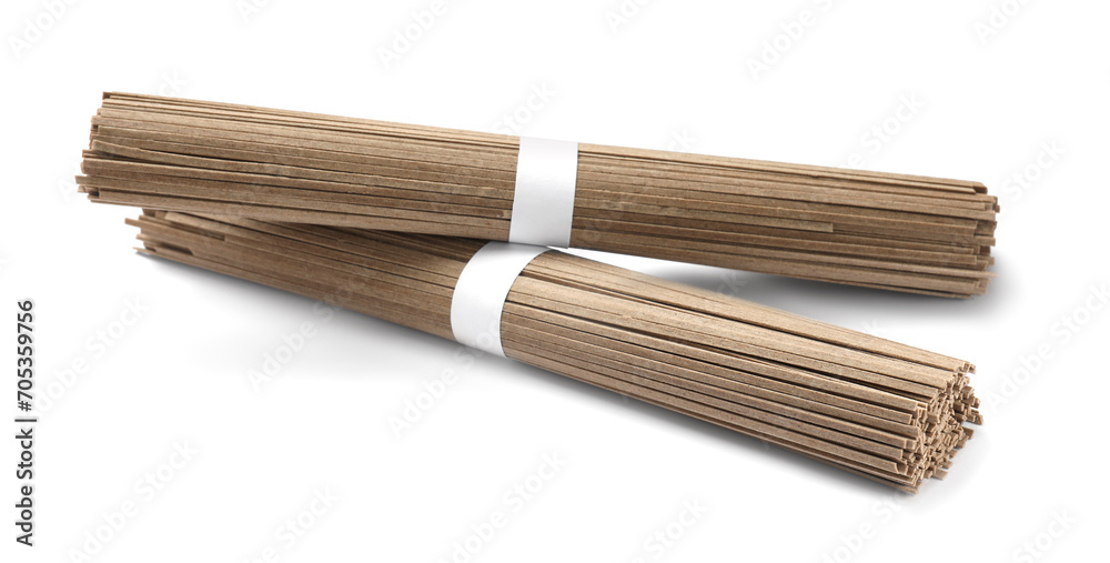 Uncooked buckwheat noodles (soba) isolated on white Uncooked buckwheat noodles (soba) isolated on white