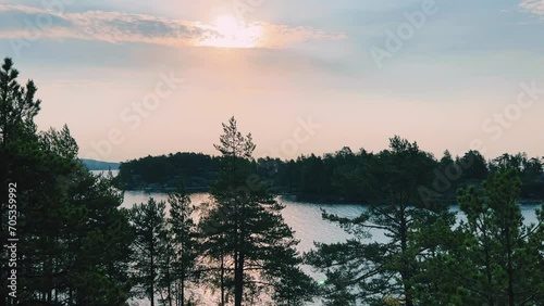 Russia, Karelia, Lake Ladoga, Koyonsaari. View of the coast of the island in a cold lake. Beautiful nature of the Republic of Karelia. Stunning panoramic view of the Ladoga Skerry Islands. 4K photo