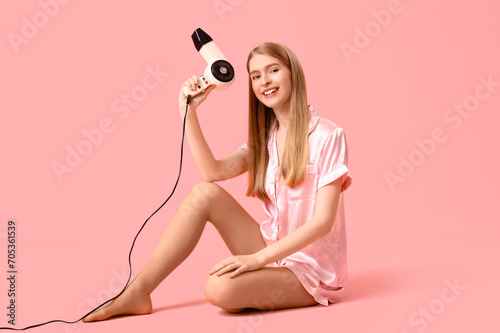 Young blonde woman in pajam...