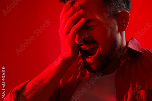 Young man having panic atta...