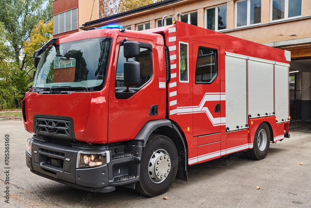 A state-of-the-art firetruck, equipped with advanced rescue technology, stands ready with its skilled firefighting team, prepared to intervene and respond rapidly to emergencies, ensuring the safety A state-of-the-art firetruck, equipped with advanced rescue technology, stands ready with its skilled firefighting team, prepared to intervene and respond rapidly to emergencies, ensuring the safety