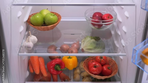 Wallpaper Mural male hands take a Chinese cabbage from the fridge with vegetable Torontodigital.ca