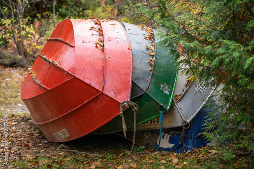 colourful boats stacked up for the winter