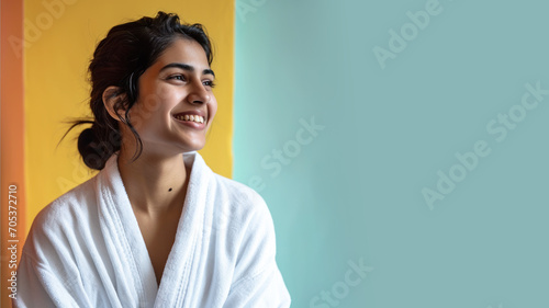 Indian woman in bathrobes  female body care and pampering in hotel spa