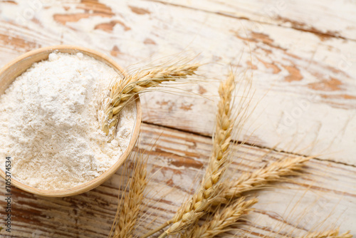 Bowl with wheat flour and s...
