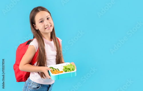 Happy little girl with back...