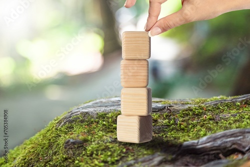 Corporate Sustainability Concept. Set of wooden cubes photo