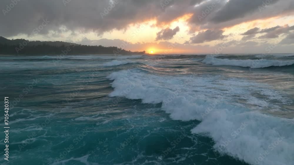 Aerial sunset view of big ocean waves breaking in Hawaii. Aerial sunset view of big ocean waves breaking in Hawaii.