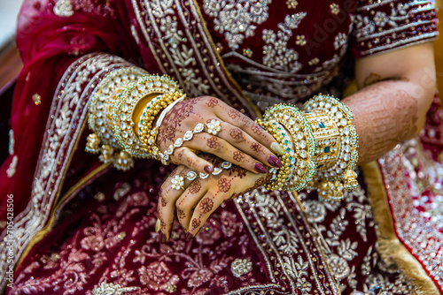 Indian bride's henna mehendi mehndi hands close up © Stella Kou