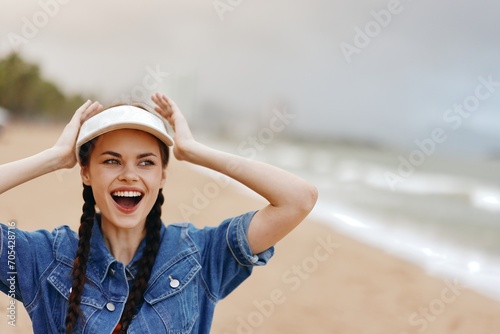 Joyful, Pretty Woman Laughing and Smiling with Happiness on a Beautiful Beach, Enjoying the Summer Vacation © SHOTPRIME STUDIO