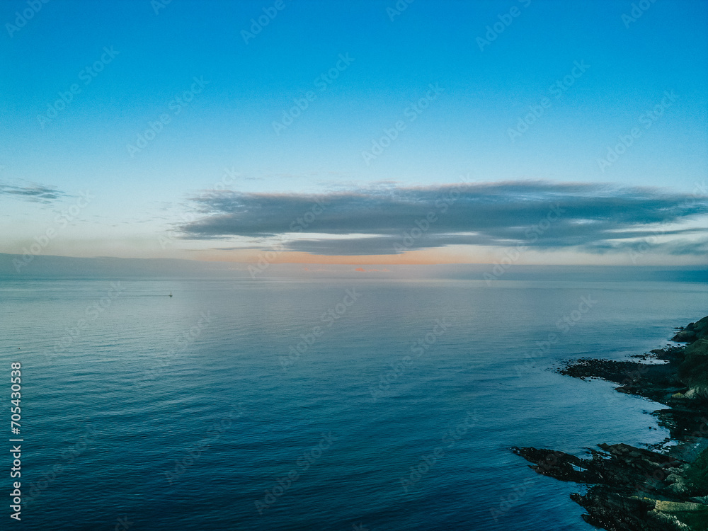 Fototapeta premium Aerial photograph of mountains and sea