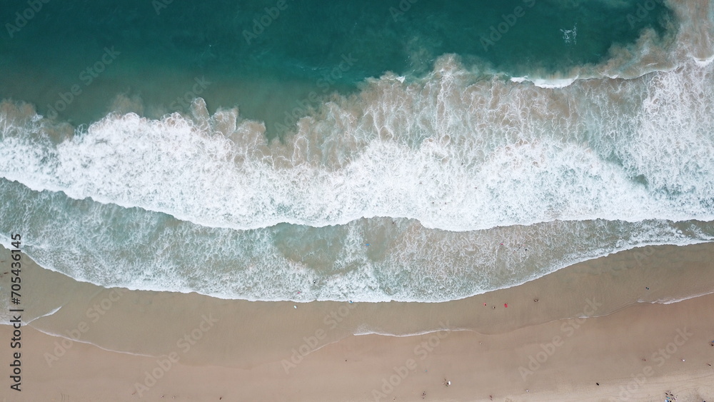 Top down aerial view of sandy tropical beach in summer in Eastern Australia, Queensland, Surfers Paradise, Gold Coast