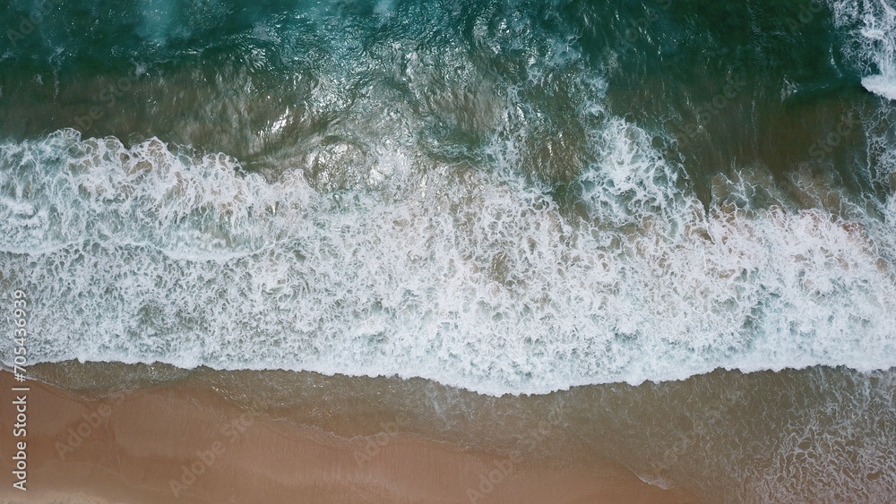 Aerial view of sandy tropical beach and surfer in summer at Eastern Australia, Queensland, Surfers Paradise, Gold Coast, Byron Bay