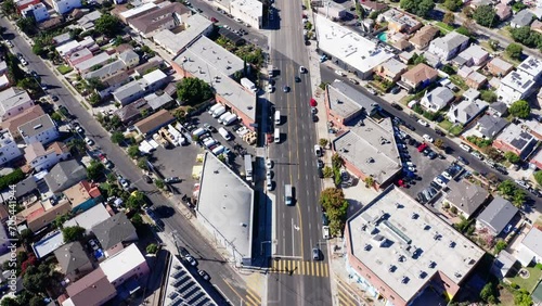 Drone Shot of Mid City, Los Angeles Central Neighborhood, Street Traffic and Buildings photo
